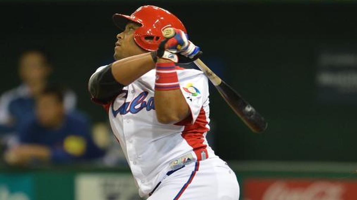 
YASMANI TOMAS pega jonrón en partido entre Cuba y Taiwán, en el Clásico Mundial del 2013.
