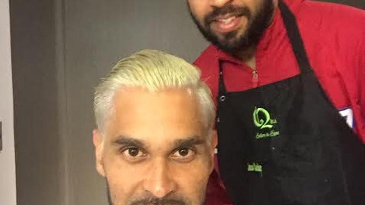 JEAN CARLOS Cruz junto a Angel Pagán, miembro del club boricua.