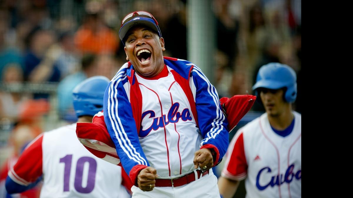 
VICTOR MESA celebra el triunfo de Cuba en el torneo internacional de Haarlem, Holanda, el 22 de julio del 2012.
