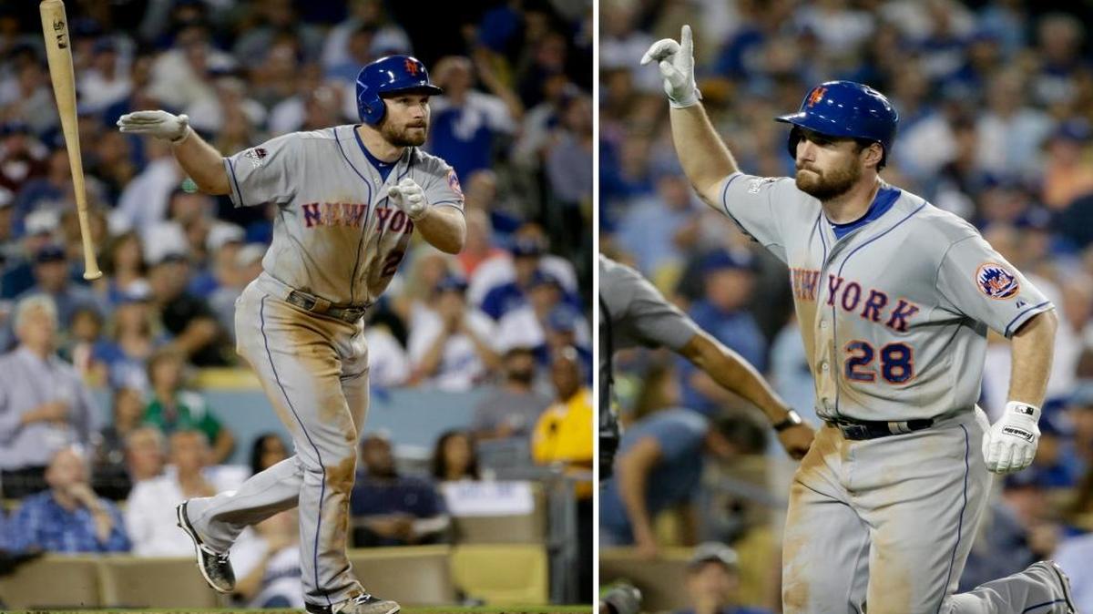 DANIEL MURPHY conecta uno de sus siete jonrones en la postemporada. El jugador estableció una nueva marca de cuadrangulares en partidos consecutivos durante la victoria de los Mets de Nueva York.