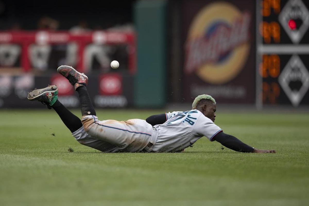 PHILADELPHIA, PA - JULY 18: Jazz Chisholm Jr. #2 of the Miami Marlins dives but cannot make the catch on a ball hit by Bryce Harper #3 of the Philadelphia Phillies (not pictured) in the bottom of the first inning at Citizens Bank Park on July 18, 2021 in Philadelphia, Pennsylvania. (Photo by Mitchell Leff/Getty Images)