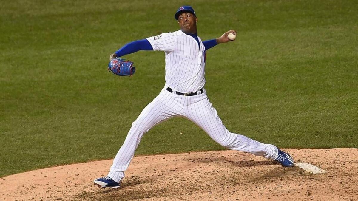 EL CUBANO Aroldis Chapman de los Cachorros de Chicago en el séptimo episodio del quinto partido de la Serie Mundial frente a los Indios de Cleveland, el 30 de octubre en el Wrigley Field.