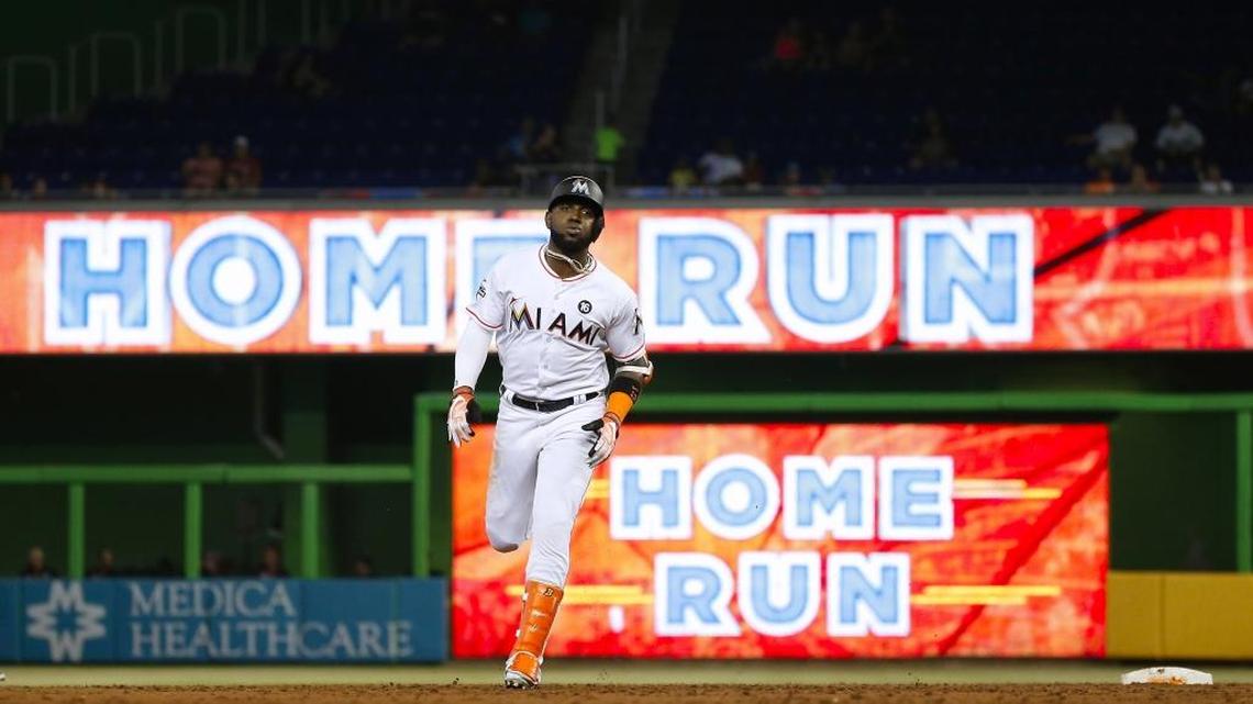 MARCELL OZUNA corre las bases tras pegar un cuadrangular el 14 de junio en Miami.