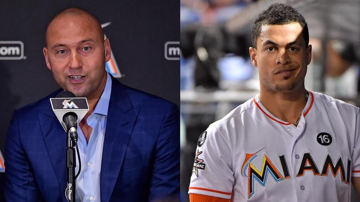 DEREK JETER se ha visto envuelto en discusiones por la posible salida de Giancarlo Stanton (d).