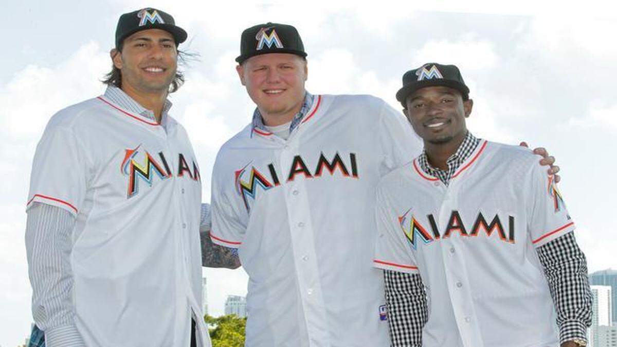 
Michael Morse, Mat Latos y Dee Gordon (de izq. a der.) son tres de los nuevos jugadores de los Marlins para la venidera temporada del 2015.


