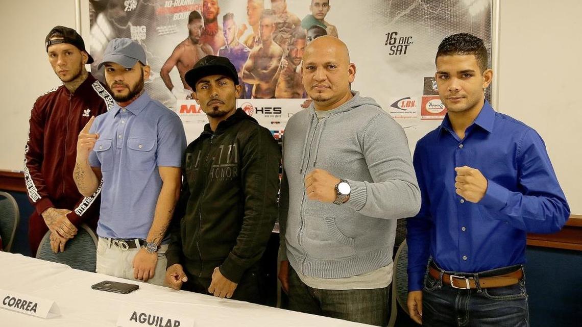 LOS PUGILES (izq. a der.) Danielle Scardina, Manny Correa, Sergio Aguilar, Celso Pinzón y Neslán Machado, que combaten este sábado en el Miami Airport Convention Center.