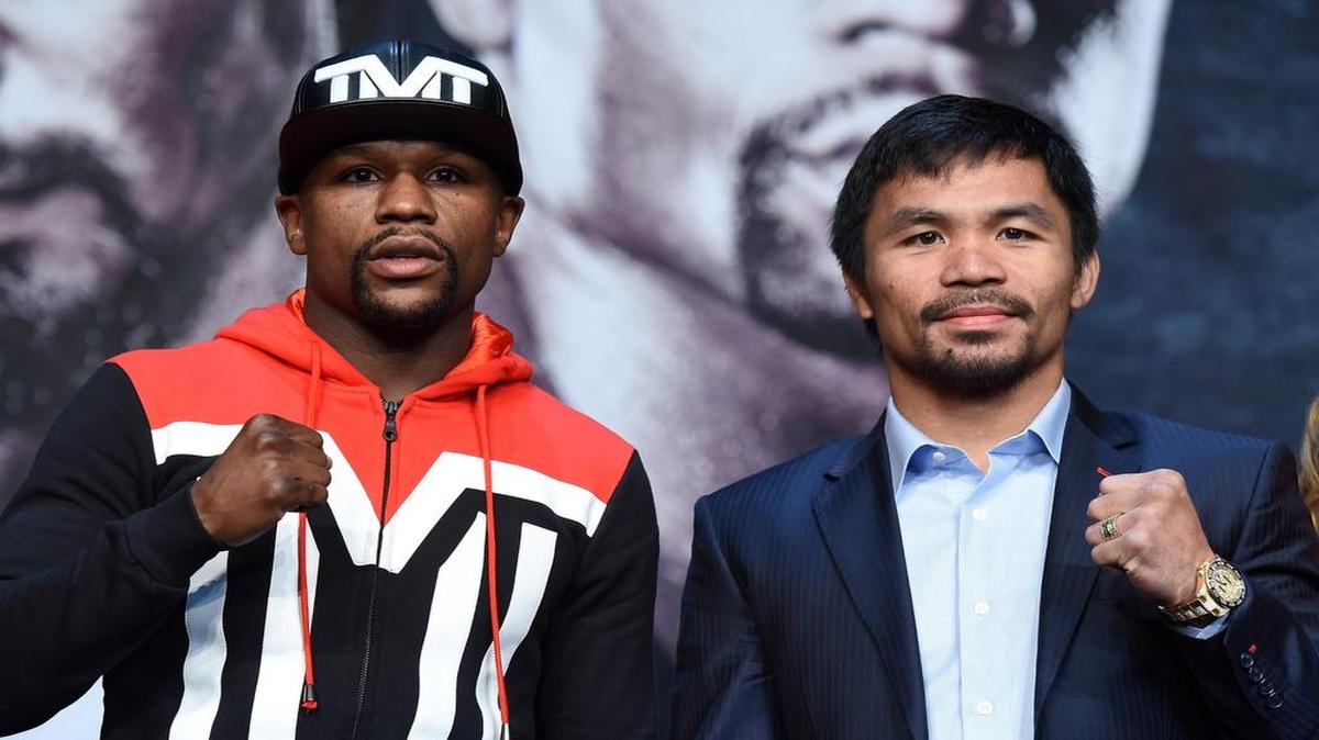 
Floyd Mayweather Jr. (izq.) y Manny Pacquiao posan durante la conferencia de prensa celebrada el 29 de abril del 2015 en el MGM Grand Hotel & Casino de Las Vegas.
