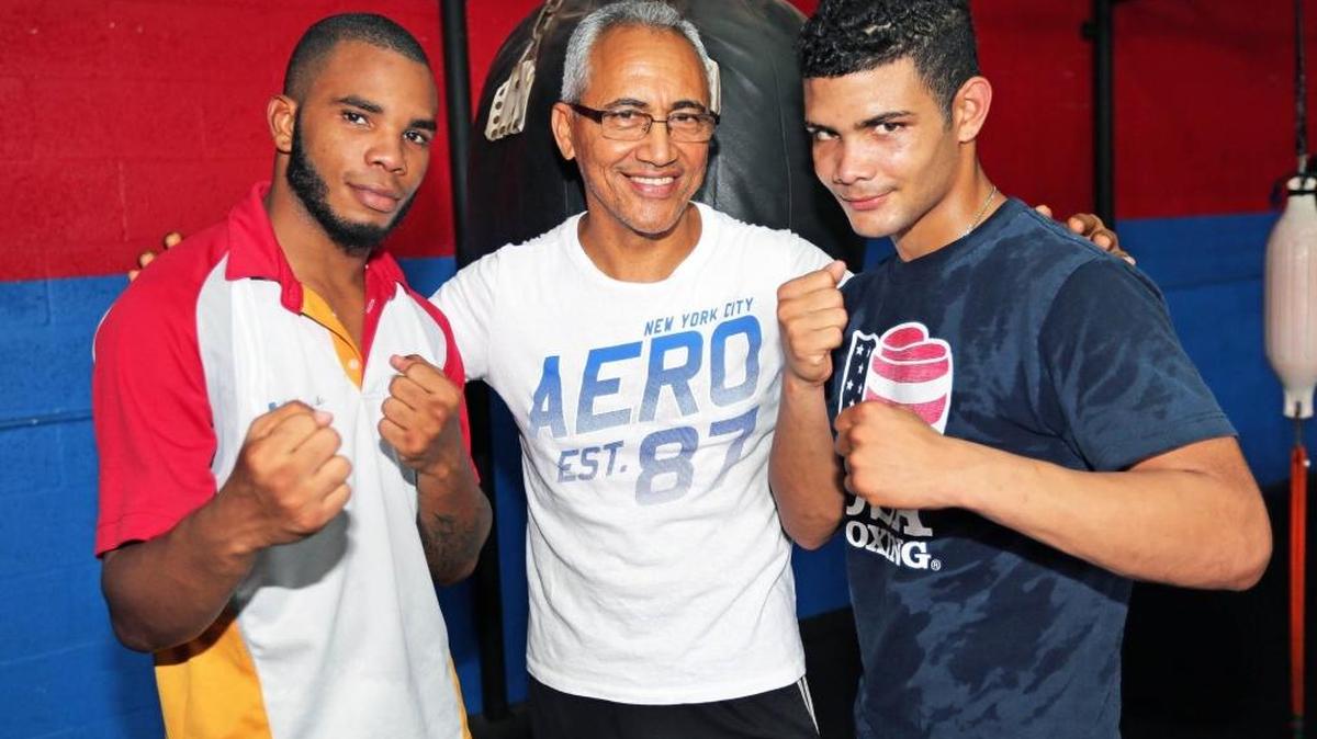 EL PROFESOR Jorge Rubio con Neslán Machado (d) y Hairon Socarrás.