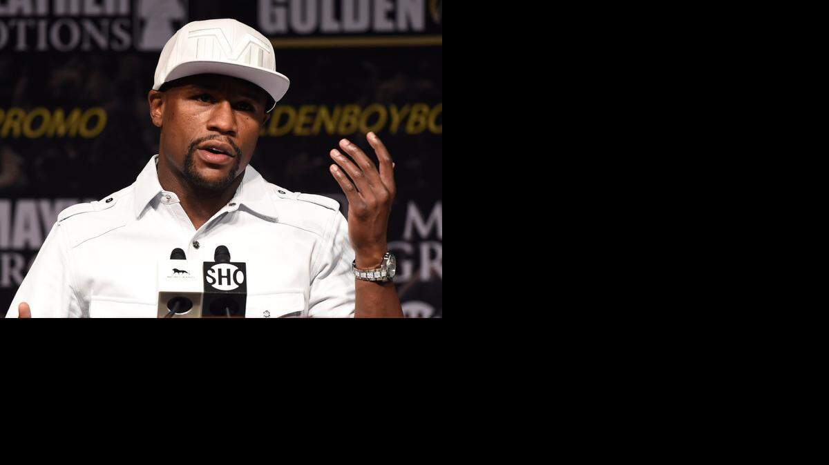 
Floyd Mayweather Jr. habla en una conferencia de prensa el miércoles 10 de septiembre en el hotel MGM Grand de Las Vegas, Nevada. El boxeador se enfrentará al argentino Marcos Maidana en un combate revancha el sábado.


