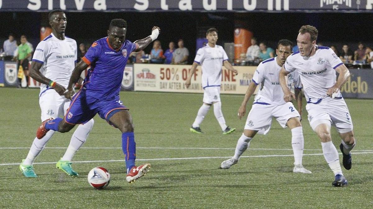 Kwadwo Poku (10) goes to score against FC Edmonton during the first half of their soccer match on Saturday, April 29, 2017 at FIU's Riccardo Silva Stadium in Miami