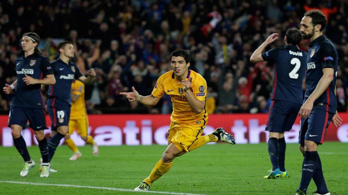 El uruguayo Luis Suarez celebra tras marcar un gol para el Barcelona ante el Atlético de Madrid, en el partido de ida de los cuartos de final de la Liga de Campeones, celebrado el martes 5 de abril del 2016 en Barcelona.