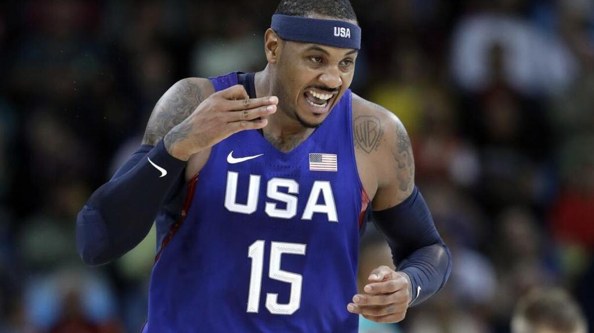 Carmelo Anthony, de Estados Unidos, celebra una de sus 11 canastas en el triunfo del miércoles contra Australia.