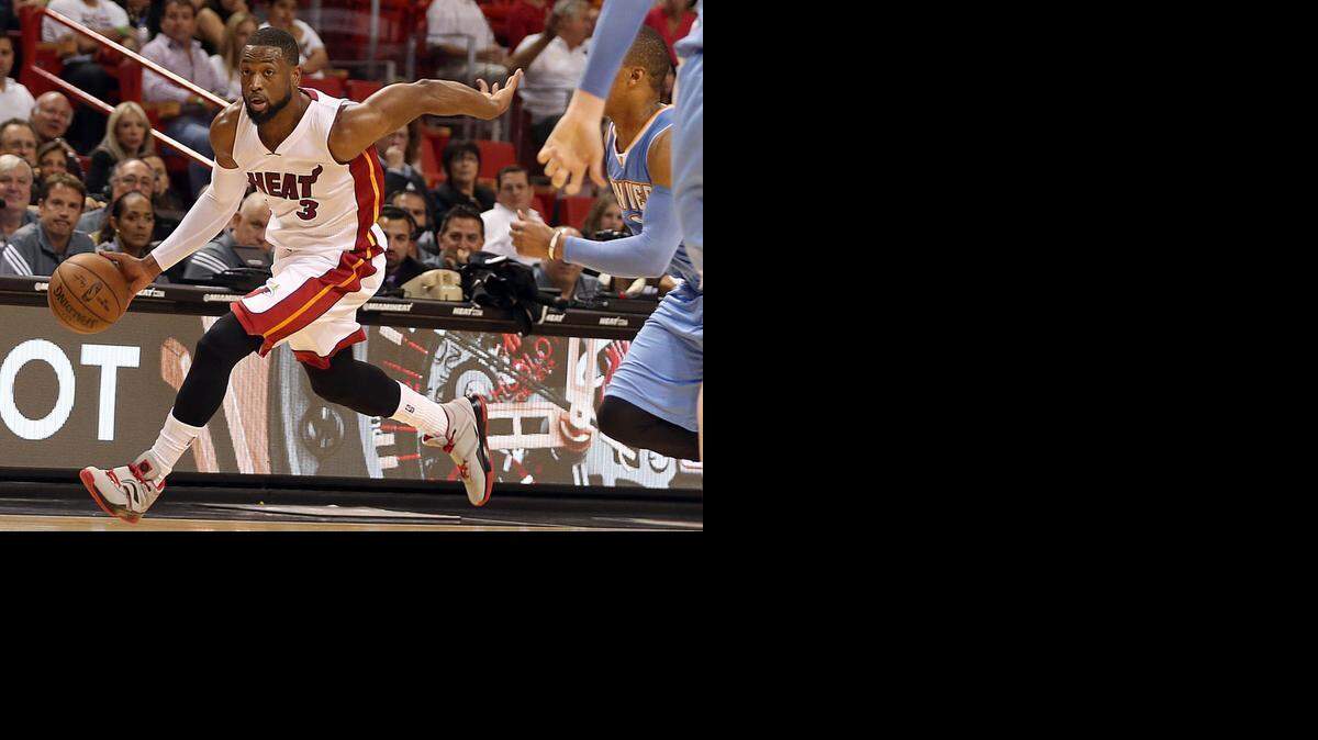 
Dwyane Wade, del Heat, contra los Nuggets, en la AmericanAirlines Arena en Miami, el 20 de marzo del 2015.
