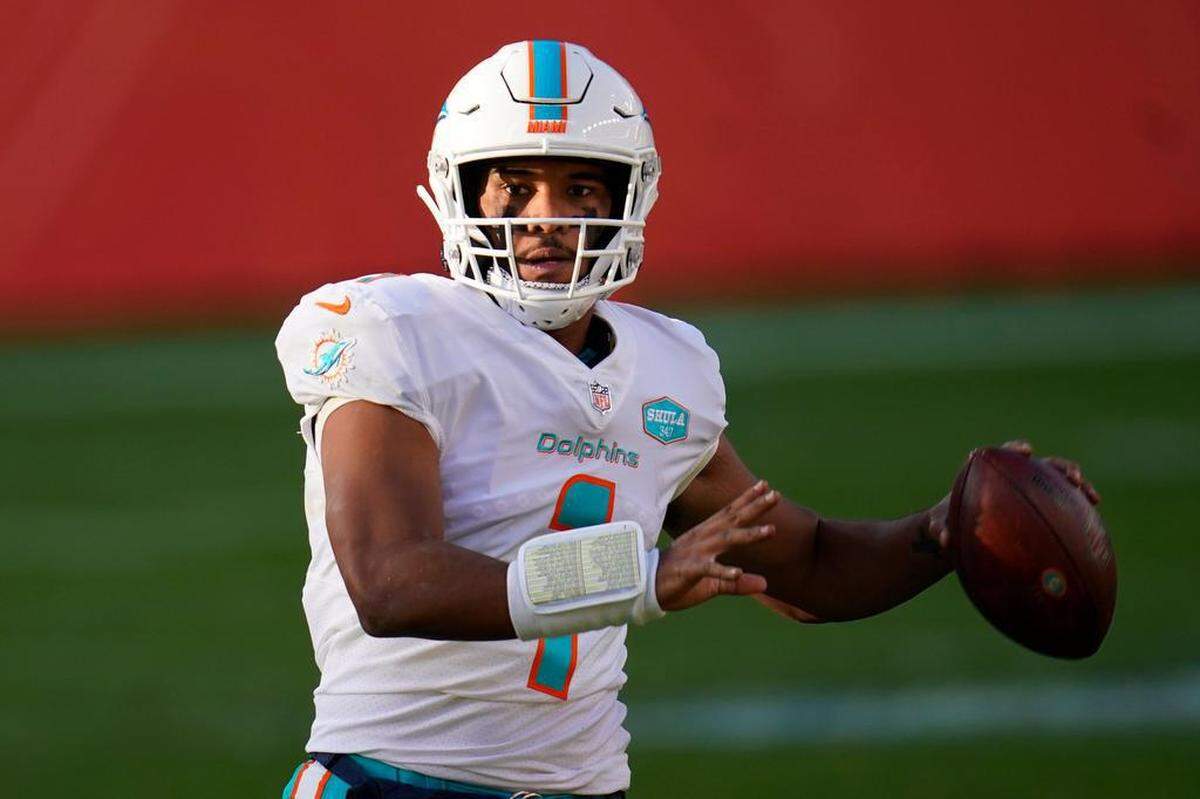 Miami Dolphins quarterback Tua Tagovailoa (1) looks to throw against the Denver Broncos during the first half of an NFL football game, Sunday, Nov. 22, 2020, in Denver. (AP Photo/David Zalubowski)