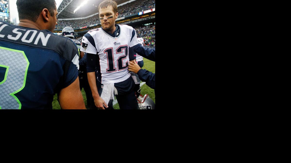 
Tom Brady (12), de los Patriots, y Russell Wilson, de los Seahawks, cuando se enfrentaron en octubre 2012.
