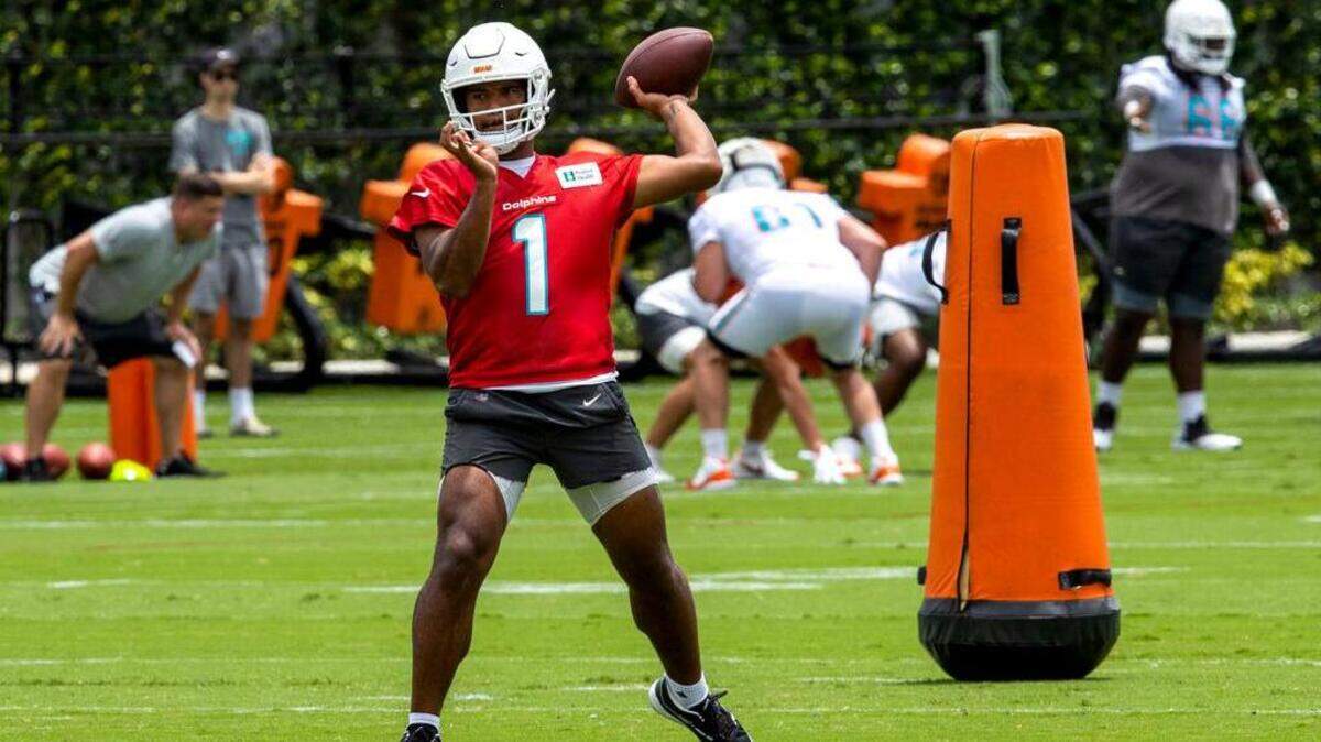 Miami Dolphins quarterback Tua Tagovailoa (1) throws the ball during the final day of OTAs at Baptist Health Training Complex in Miami Gardens, Florida, on Tuesday, June 7, 2022.