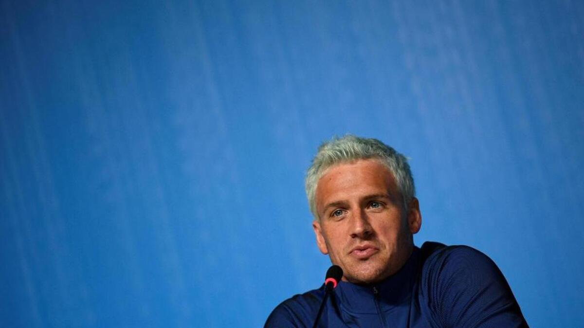 Ryan Lochte dijo ahora que el asalto no se habría producido mientras circulaban la madrugada del domingo con un taxi de regreso a la Villa Olímpica de Río, como habían contado inicialmente, sino en una gasolinera