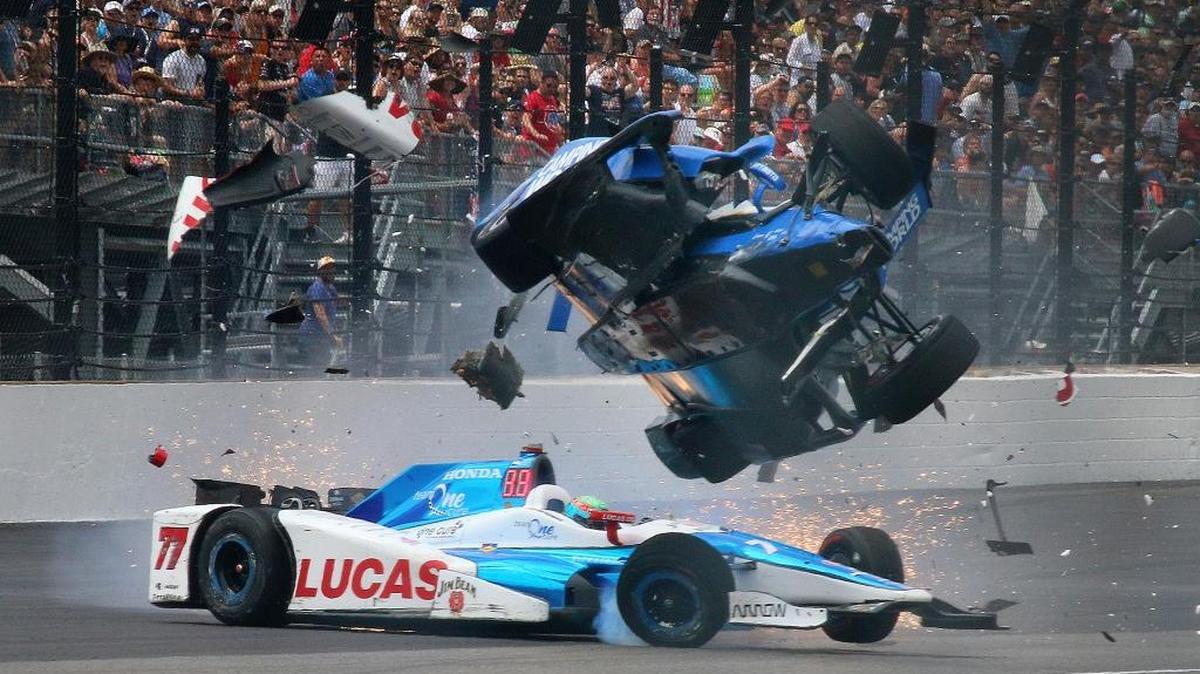 Scott Dixon (9) goes airborne after hitting  Jay Howard (77) in the 2017 Indianapolis 500. Dixon's bouncing crash landing convinced many spectators at the south end of the Indianapolis Motor Speedway that they'd just seen Dixon die.