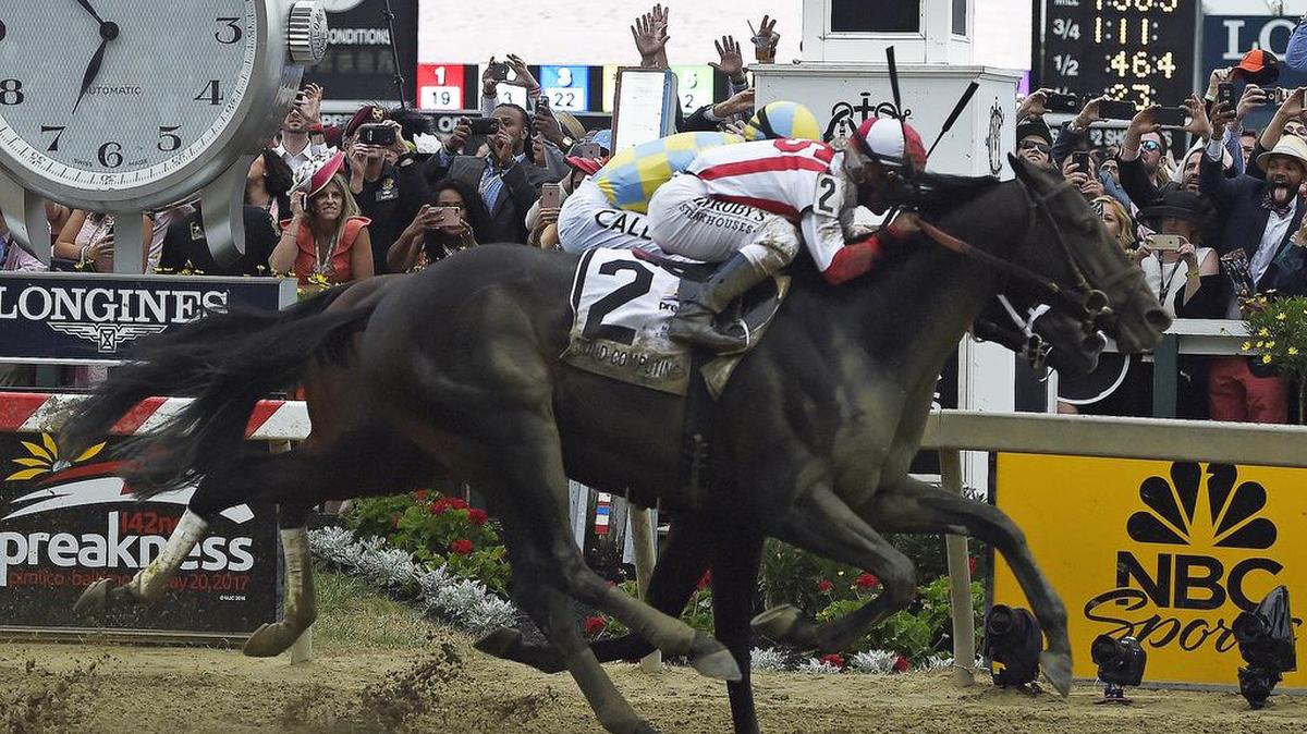 Cloud Computing (2), conducido por el venezolano Javier Castellano, gana la 142 edición del Preakness Stakes, en el hipódromo de Pimlico, en sensacional final sobre Classic Empire, montado por Julien Leparoux, el sábado 20 de mayo del 2017, en Baltimore Maryland.