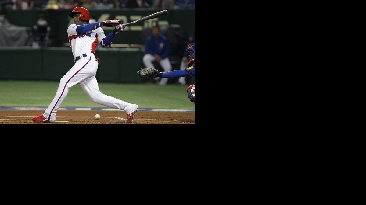 
GUILLERMO HEREDIA consume turno en el pasado Clasico Mundial de Beisbol en marzo del 2013.


