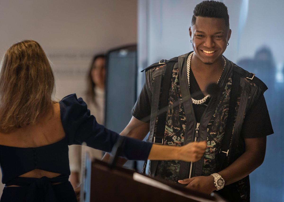 Miami Beach, Florida, September 20, 2023 - Singer Venesti heads for the podium at the Billboard press conference in the Faena Forum in Miami Beach.