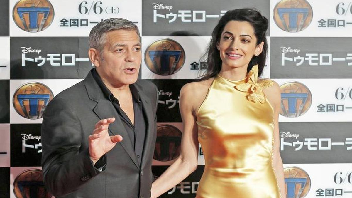 
El actor estadounidense George Clooney y su esposa Amal Clooney en la presentación de ‘Tomorrowland. El mundo del mañana’, en Tokio, Japón.
