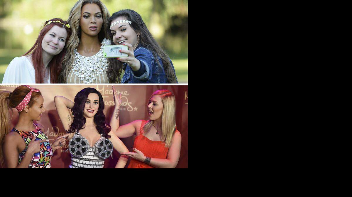 
Beyoncé (arriba, haciéndose un ‘selfie’) y Katy Perry (abajo, en el centro) son las auténticas reinas de las redes sociales.
