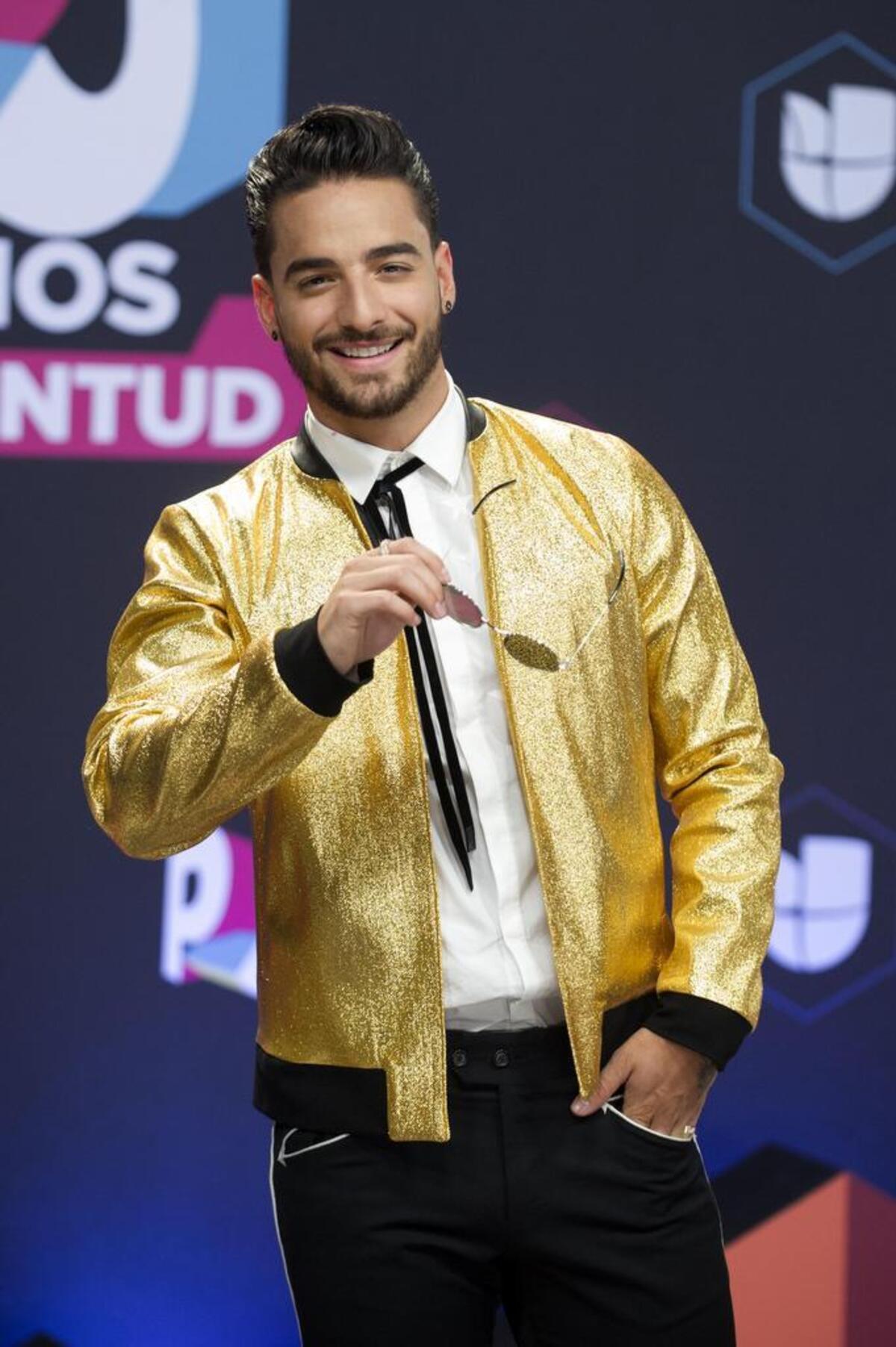 El cantante colombiano Maluma posa para los medios en la alfombra de la decimocuarta edición de los Premios Juventud el jueves 6 de julio 2017, en el Wasco Center de Coral Gables.