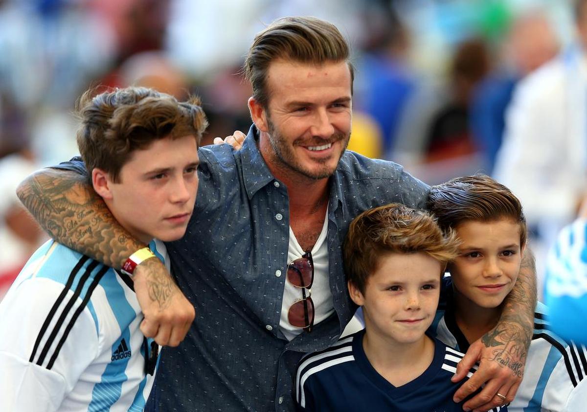 David Beckham and his sons, from left: Brooklyn, Cruz and Romeo in 2014.