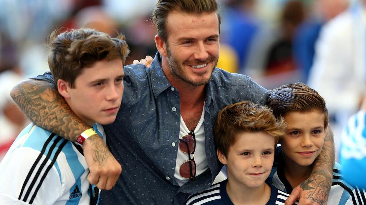David Beckham and his sons, from left: Brooklyn, Cruz and Romeo in 2014.