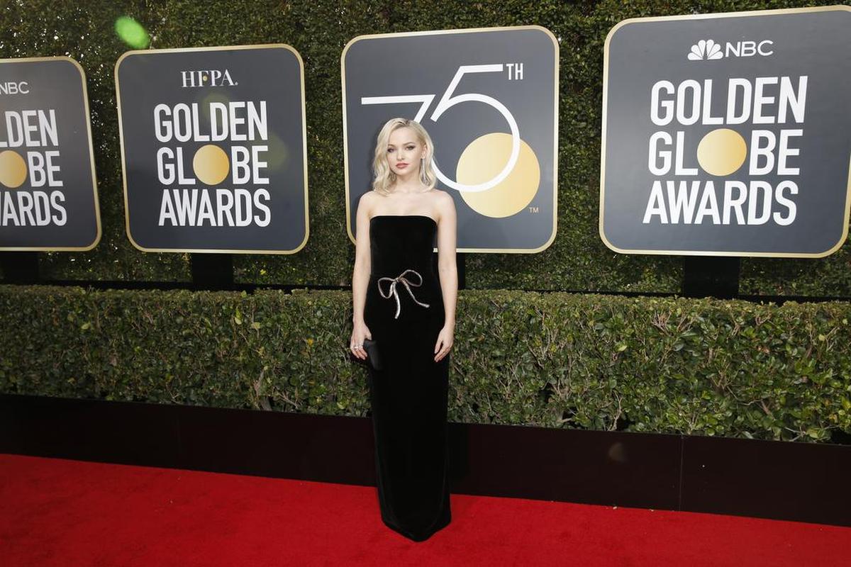 Dove Cameron llega a la 75º ceremonia de los premios Globos de Oro en el Beverly Hilton Hotel el domingo 7 de enero de 2018 en Beverly Hills, California.