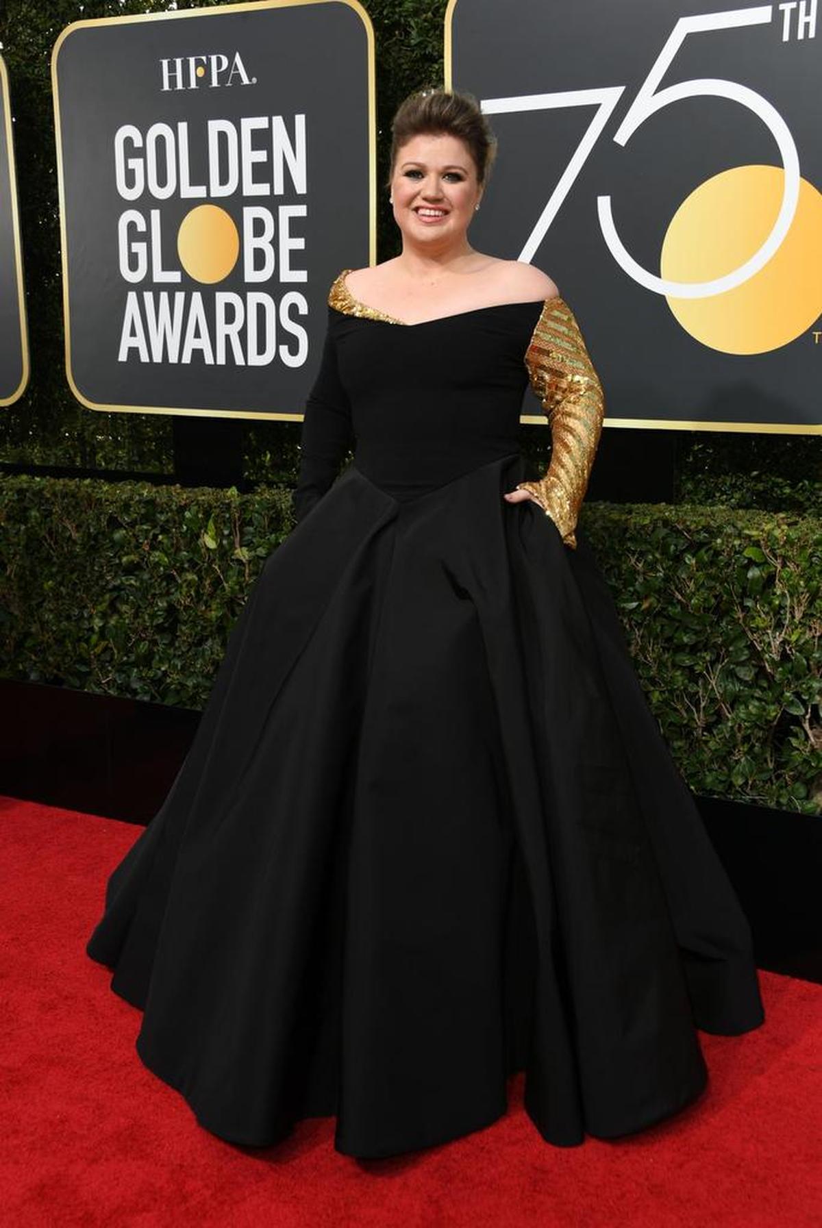 Kelly Clarkson llega a la 75º ceremonia de los premios Globos de Oro en el Beverly Hilton Hotel el domingo 7 de enero de 2018 en Beverly Hills, California.