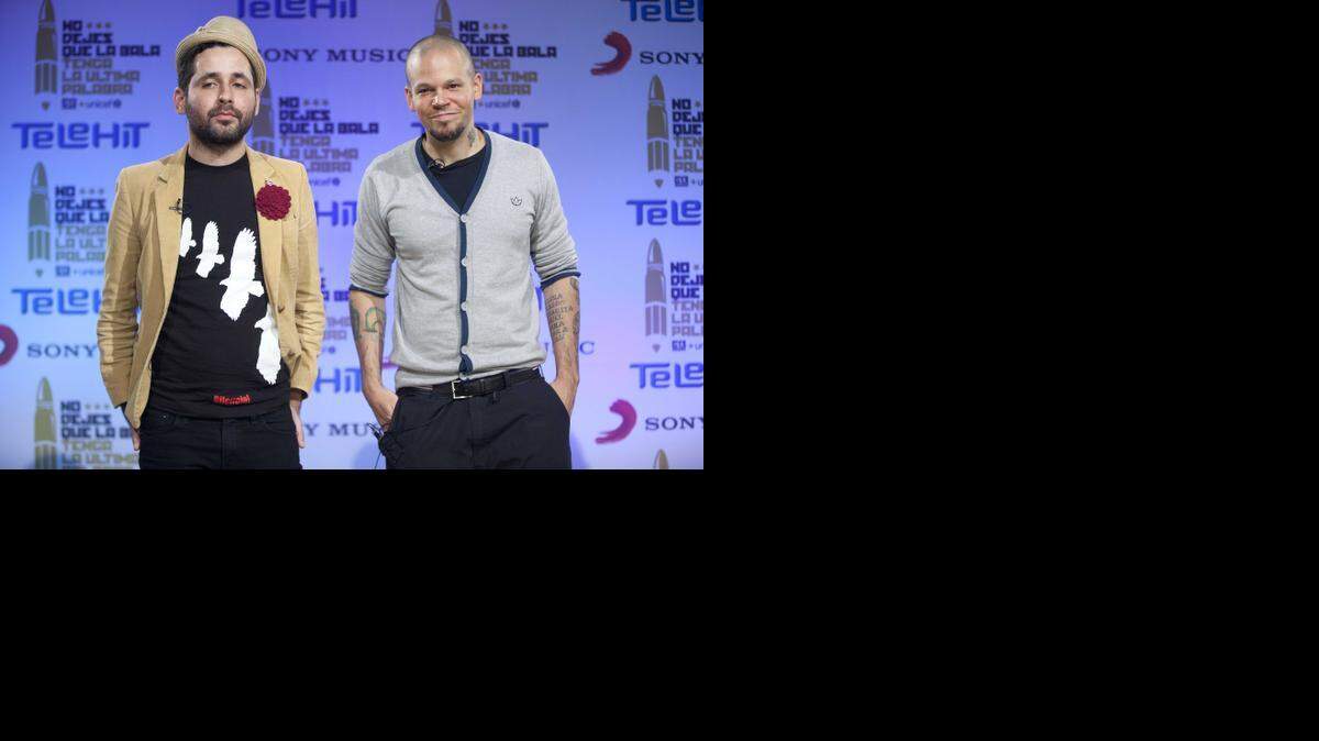 
Eduardo Martínez (Visitante, der.) y René Pérez (Residente), durante una conferencia de prensa en noviembre del 2012 en Ciudad de México. La banda está de gira por EEUU en octubre del 2014
