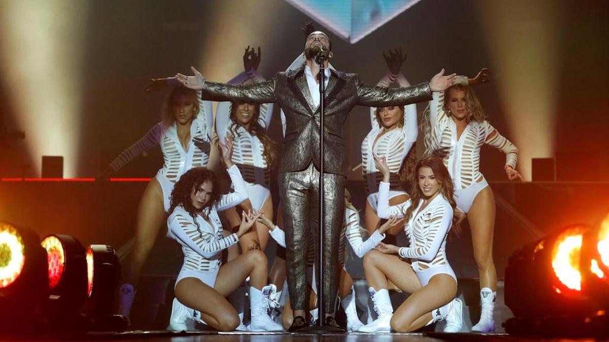El cantante colombiano Maluma, durante el concierto que ha ofrecido esta noche en el Palacio de los Deportes de Madrid, incluido en su gira mundial “Fame”, y que le llevará por distintas ciudades españolas.