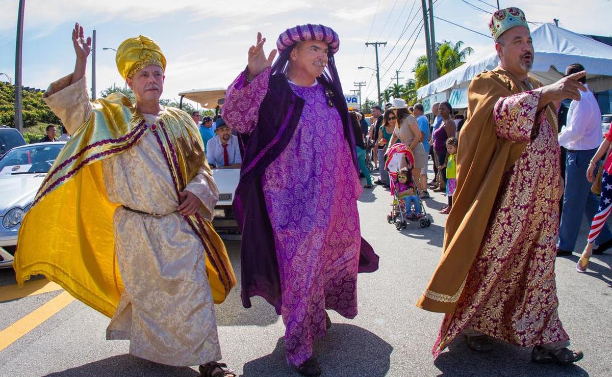 Three men dressed like the Three Kings walk along Southwest Eighth Street in Miami during the Three Kings Day Parade in 2014. File photo