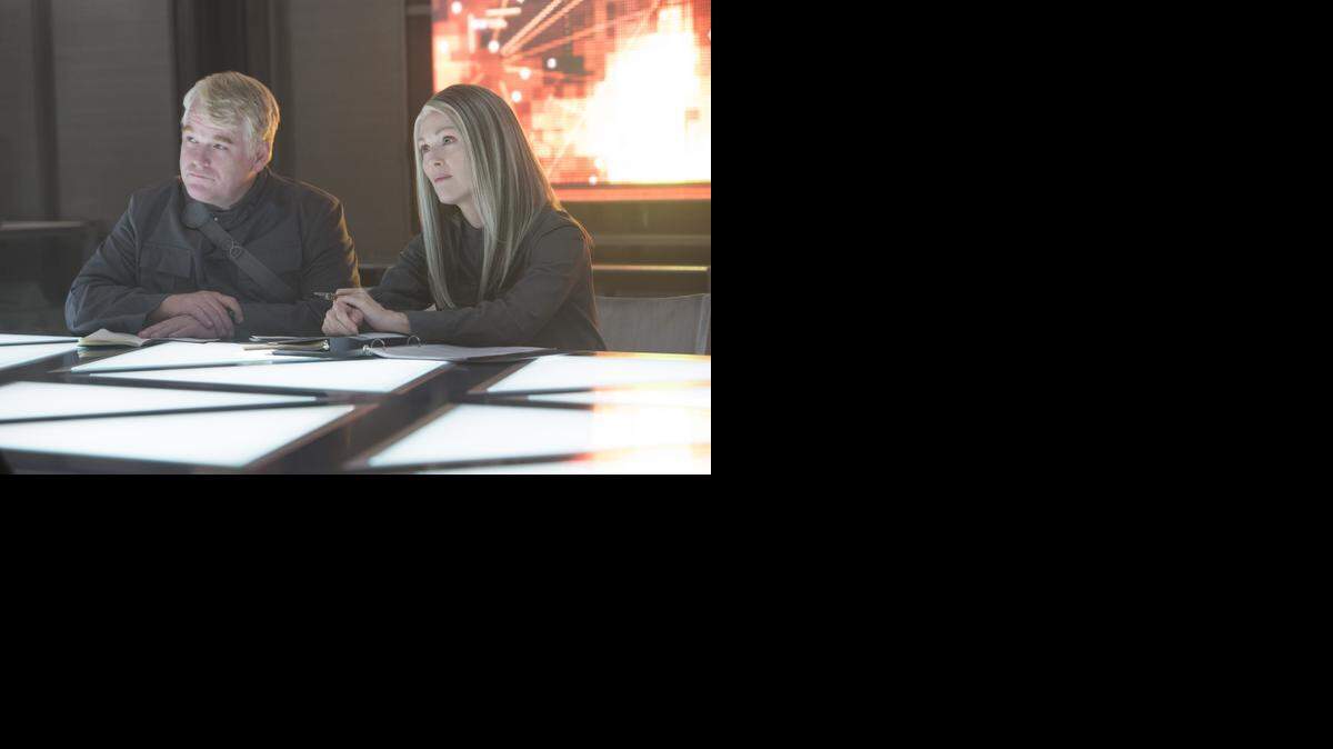 
Philip Seymour Hoffman y Julianne Moore en ‘The Hunger Games: Mockingjay Part 1’, que lleva tres semanas como la más taquillera.
