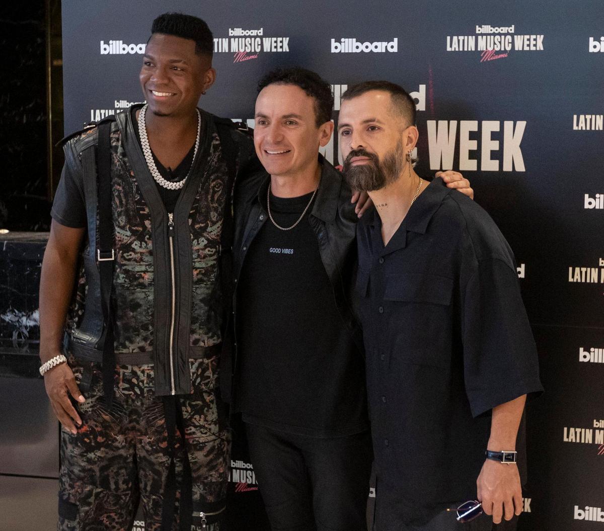 Miami Beach, Florida, September 20, 2023 - left to right, Performing artists, Venesti, Fonseca and Mike Bahía pose for photos at the Billboard press conference in the Faena Forum in Miami Beach.