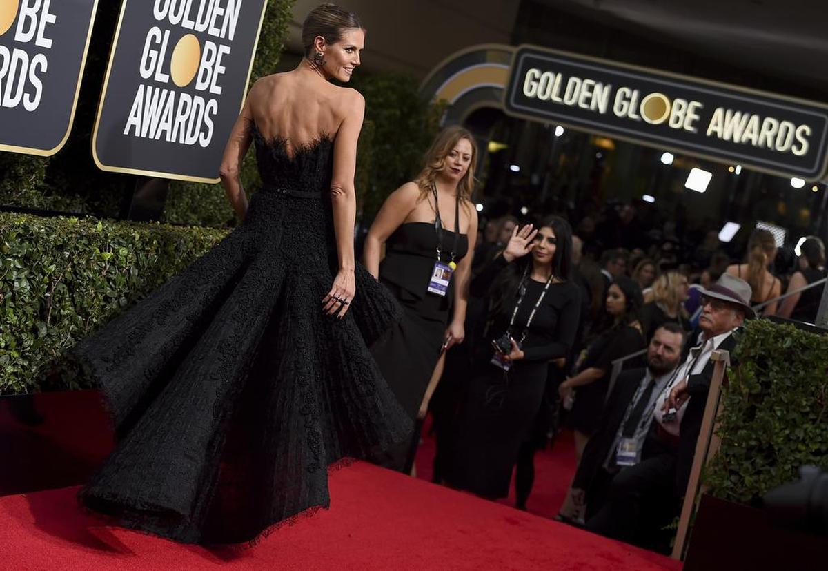 Heidi Klum llega a la 75º ceremonia de los premios Globos de Oro en el Beverly Hilton Hotel el domingo 7 de enero de 2018 en Beverly Hills, California.