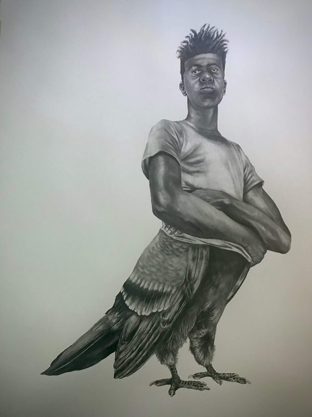 Dibujo de Rashaun Rucker que utiliza la paloma para mostrar lo estereotipos de hombre negros, en N’Namdi Contemporary Fine Arts.
