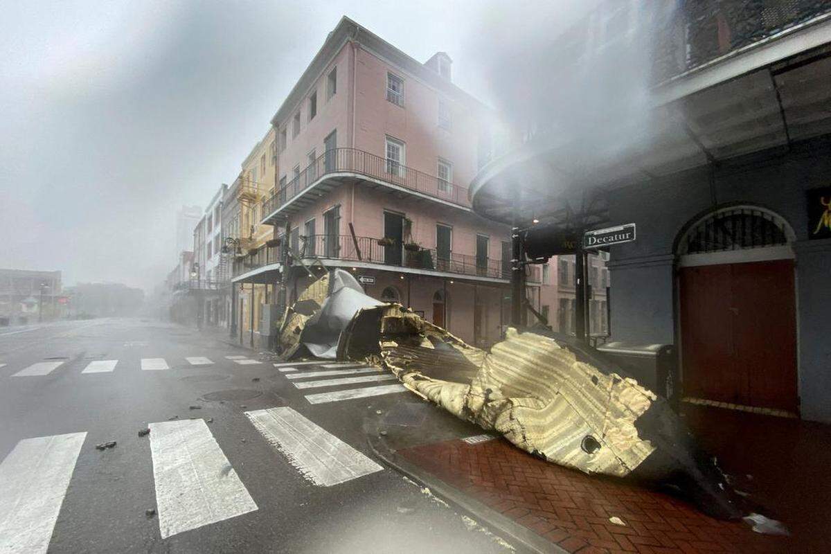 Part of a building’s roof is seen after being blown away during rain and winds in the French Quarter of New Orleans, Louisiana, on August 29, 2021 during Hurricane Ida.