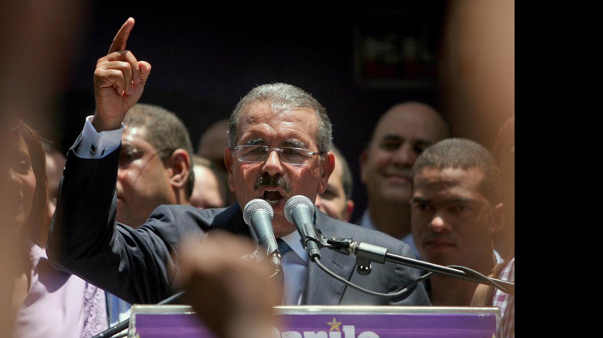 
El presidente dominicano Danilo Medina habla en un mitin en el 2012. Su Partido de la Liberación Dominicana anunció el sábado su candidatura presidencial por aclamación para los comicios del 2016.
