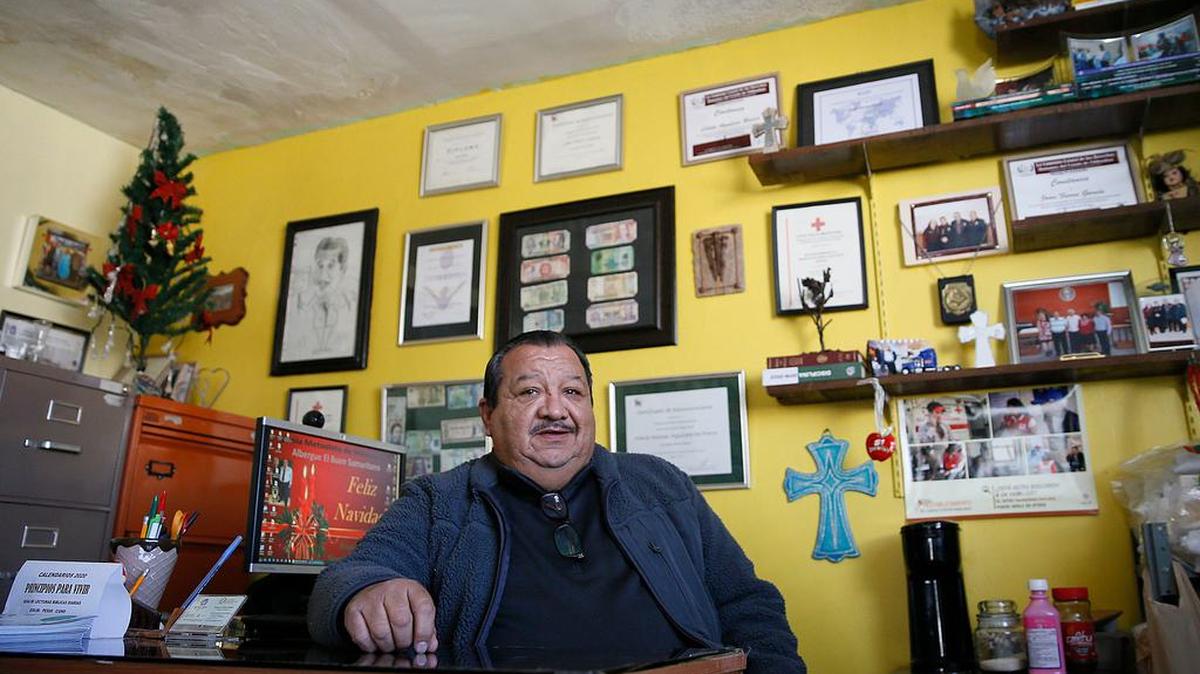 El Buen Samaritano pastor Juan Fierro talks about traditions they do at the shelter leading up to Christmas Wednesday, Dec.18, in Ciudad Juâ¡rez, Mexico.