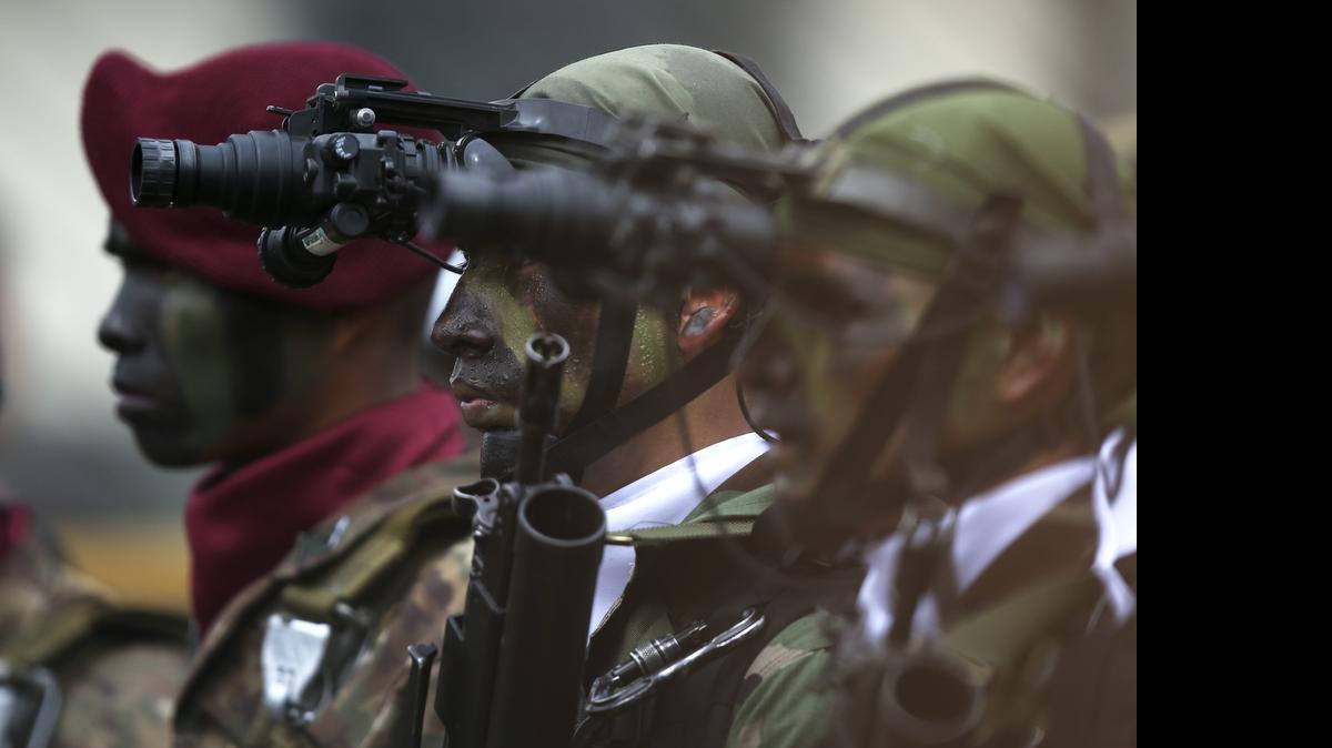 
Soldados de los batallones de Fuerzas Especiales participan el miércoles en el desfile cívico-militar de conmemoración de los 194 años de Independencia del país, en Lima. 
