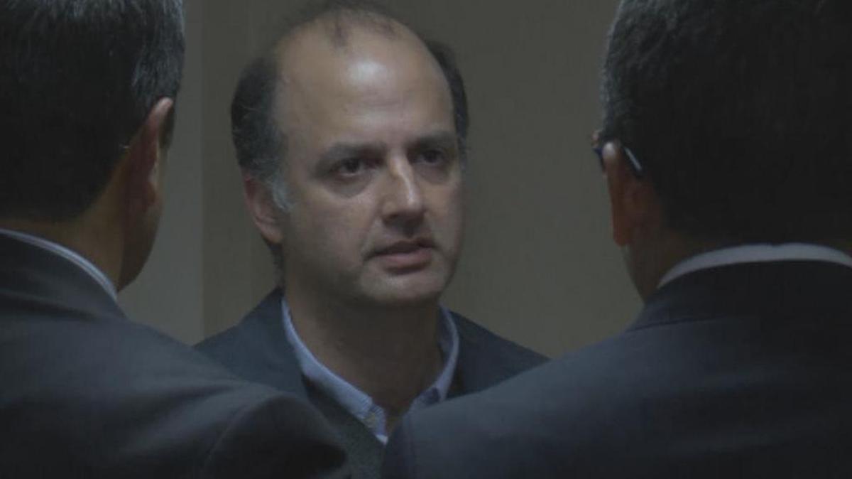 Captura de video del ex viceministro de Transporte, Gabriel García Morales (c), durante su detención en los Juzgados de Paloquemao, en Bogotá (Colombia) el viernes 13 de enero de 2017. Alemán