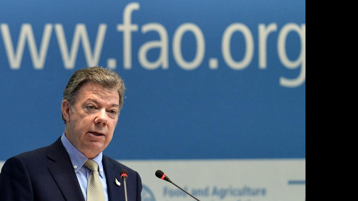 
El presidente de Colombia, Juan Manuel Santos, da un discurso durante la reunión general de la Organización de las Naciones Unidas para la Alimentación y la Agricultura (FAO), el sábado en Roma. 
