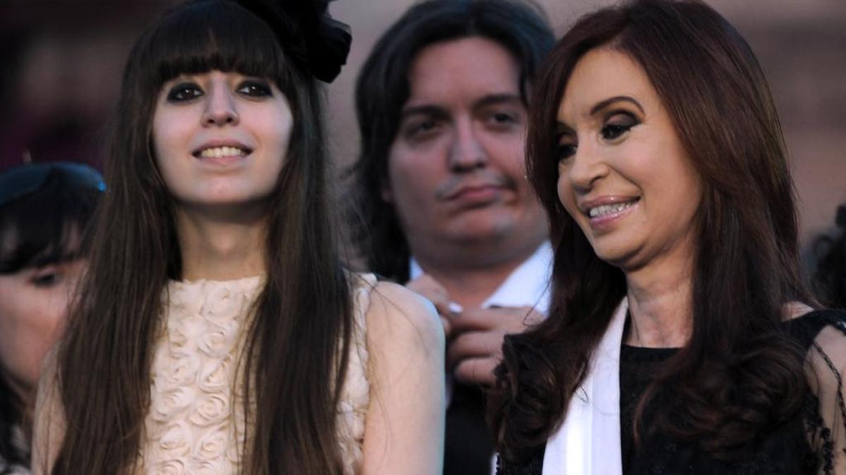 In this file photo taken on December 10, 2011, Argentina’s reelected President Cristina Fernández de Kirchner, right, smiles next to her daughter Florencia, left, and her son Maximo, during her inauguration ceremony, in Buenos Aires.