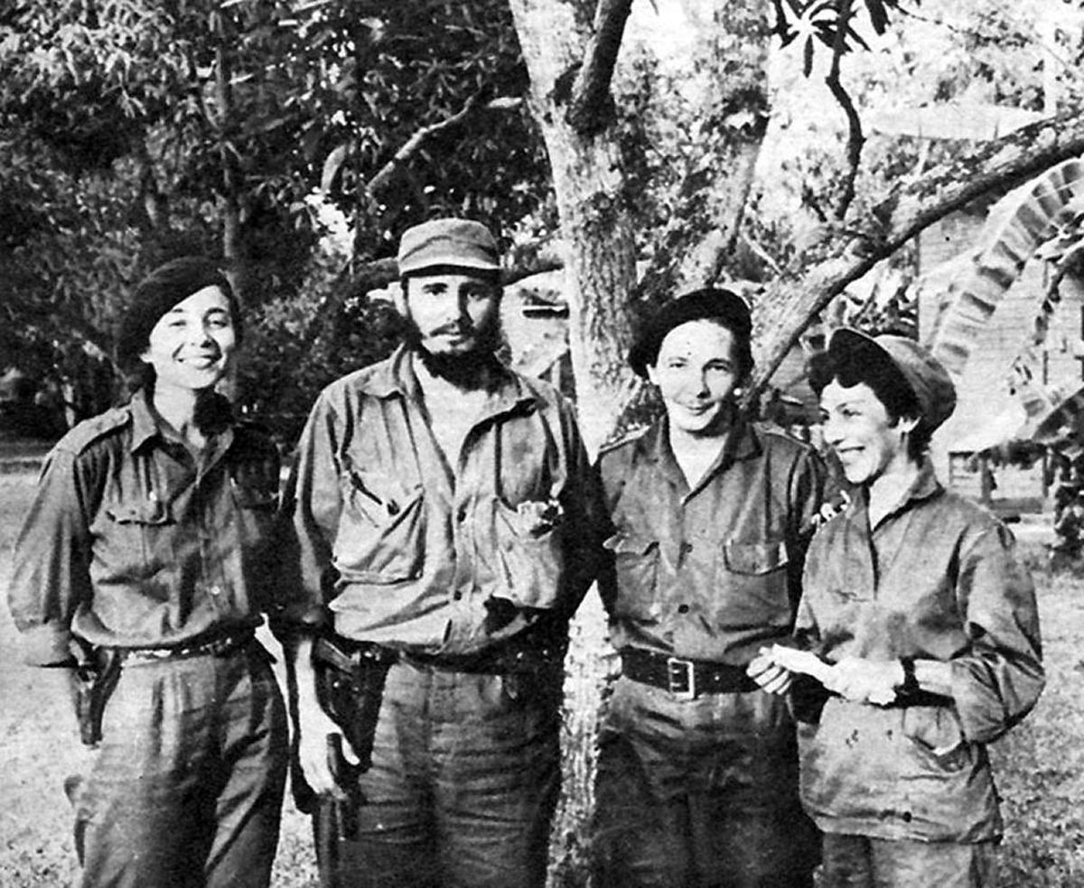 Raúl Castro, second from right, stands next to his future wife, Vilma Espín, brother Fidel Castro and guerrilla leader Celia Sánchez in Cuba’s Sierra Maestra mountains during the Cuban Revolution.