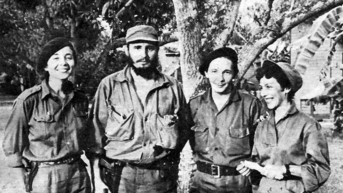 Raúl Castro, second from right, stands next to his future wife, Vilma Espín, brother Fidel Castro and guerrilla leader Celia Sánchez in Cuba’s Sierra Maestra mountains during the Cuban Revolution.