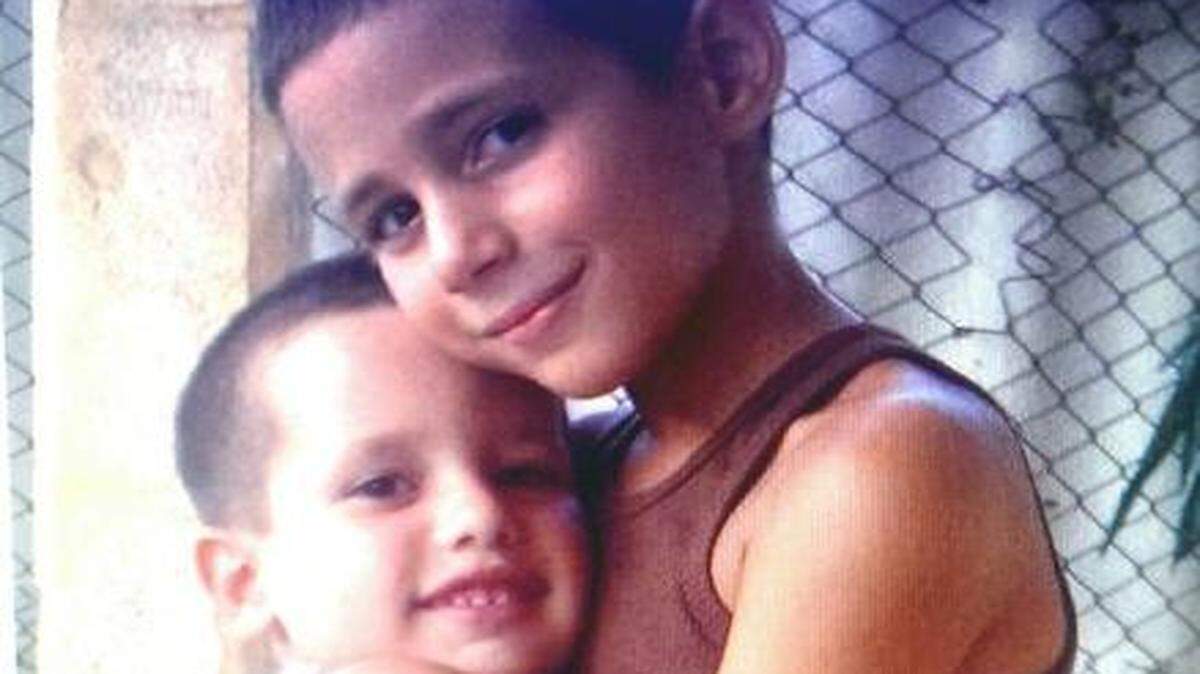 
Los niños cubanos Darío y Danilo, retenidos en México junto con su madre, Dianelis Zamora Ramos.
