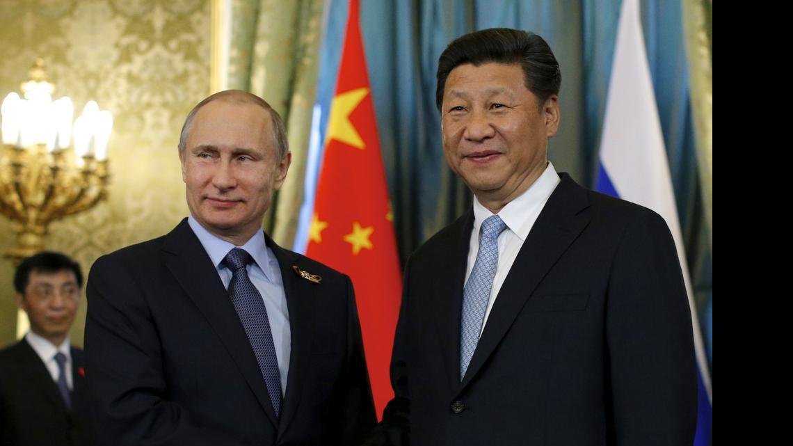 
Los presidentes de Rusia y China, Vladimir Putin y Xi Jinping en Moscú.
